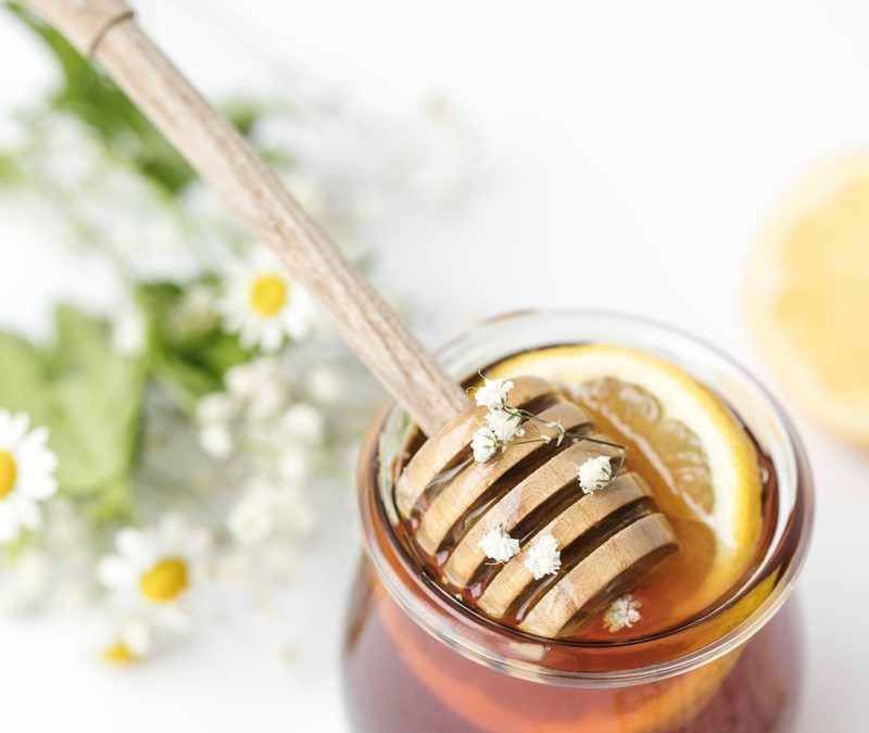 honey in glass on tabel